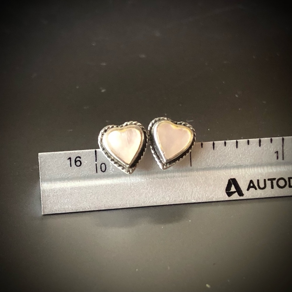 Set of earrings-Mother of Pearl and silver heart shaped earrings.